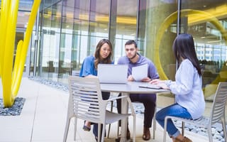 Liberty Mutual colleagues having a meeting outside at the office
